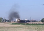 SD70MACs showing of brute force as they pull out of the yard